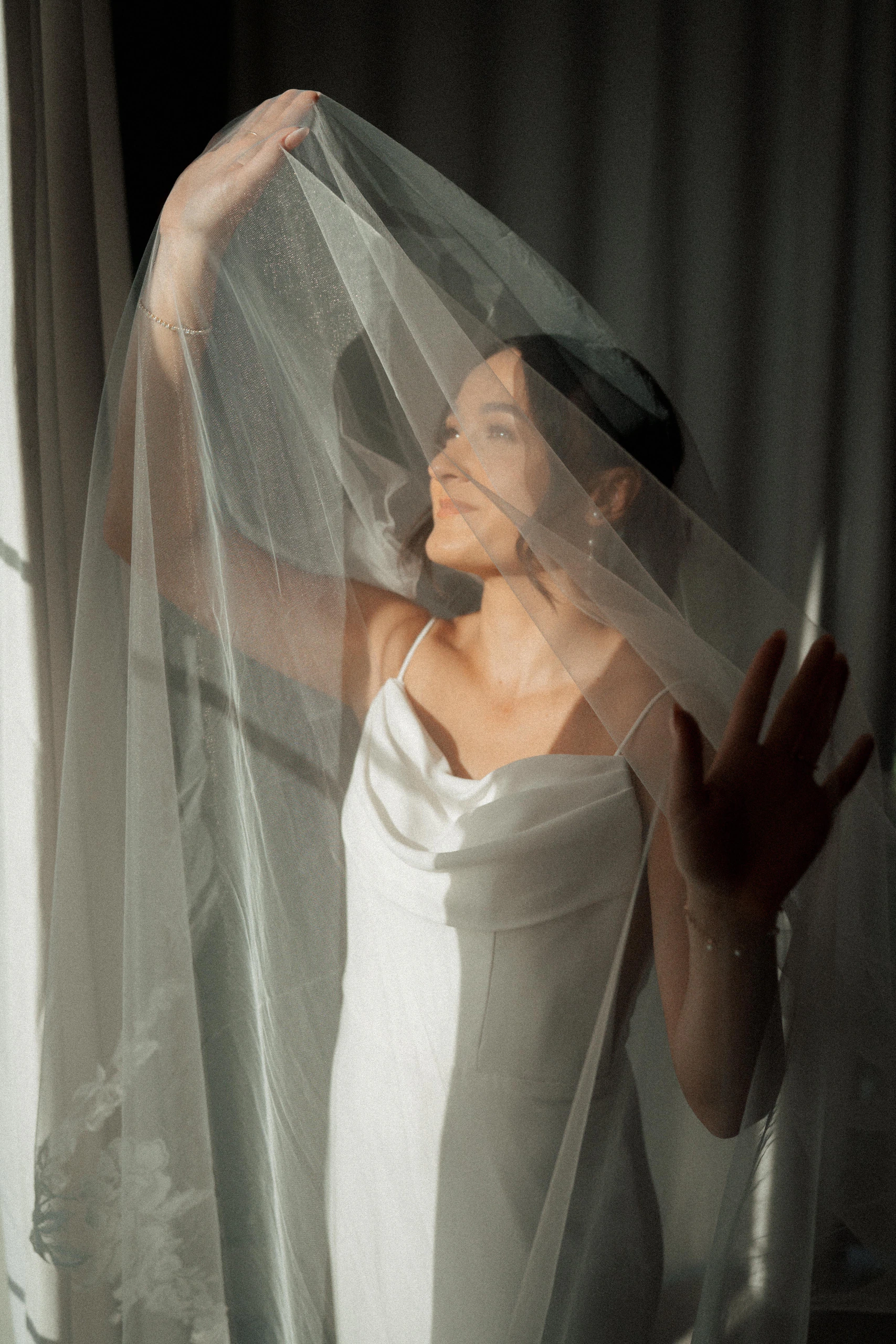 Orlando bride beneath her veil photographed by Febus Films