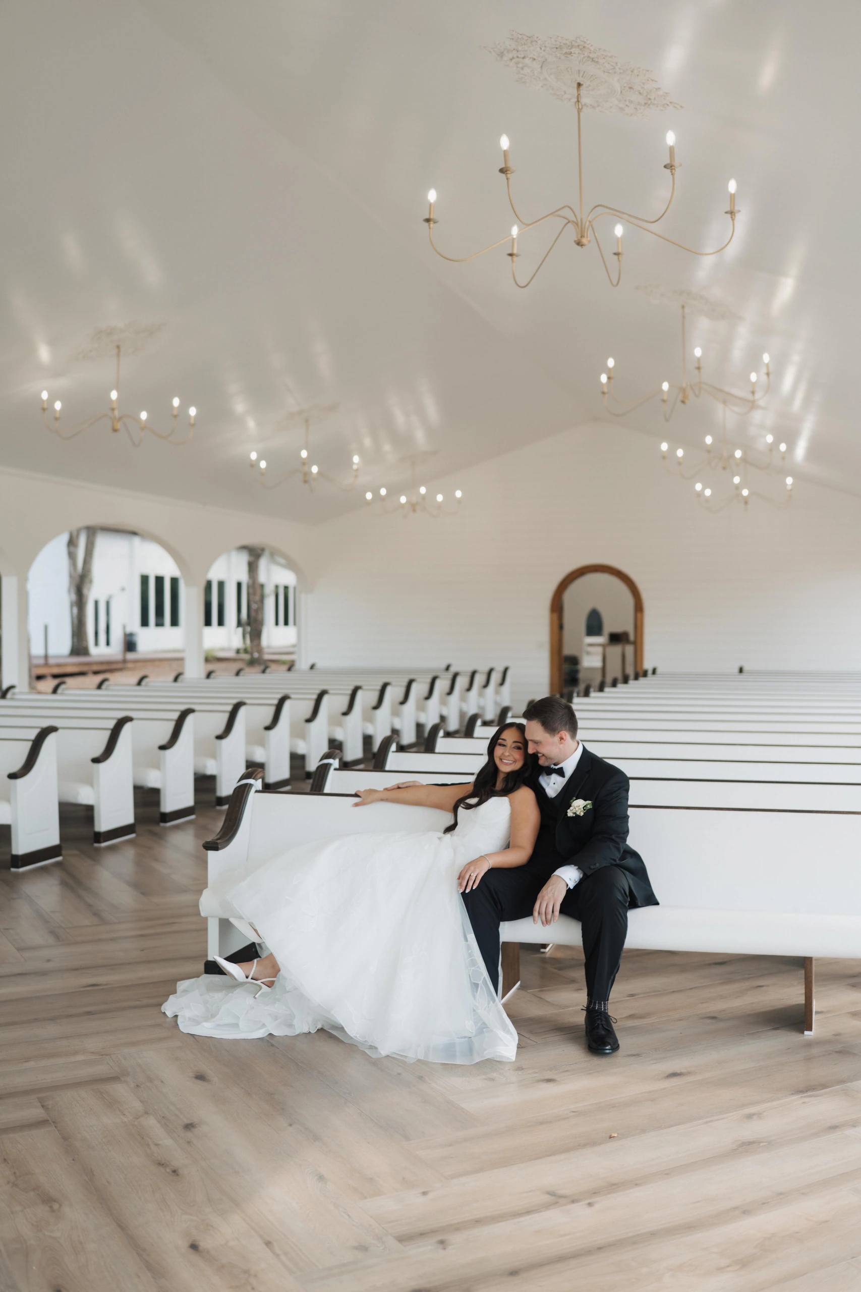 Orlando newlyweds sharing a quiet moment in a chapel