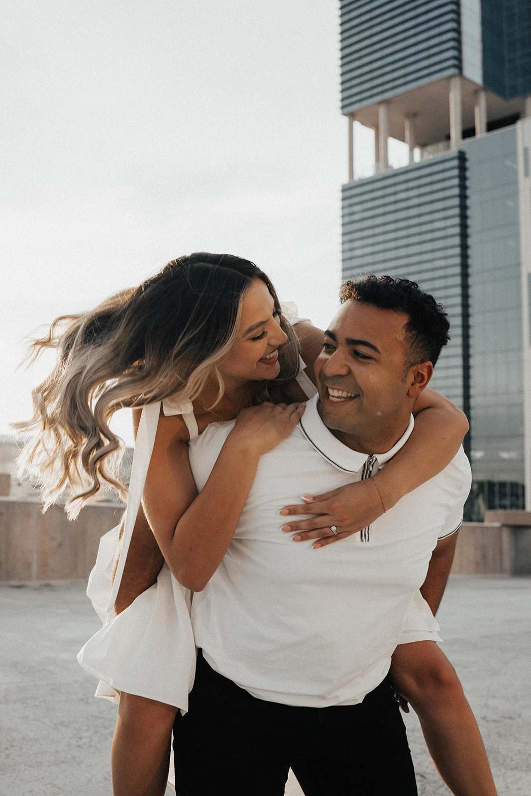 Playful Orlando engagement session piggyback portrait